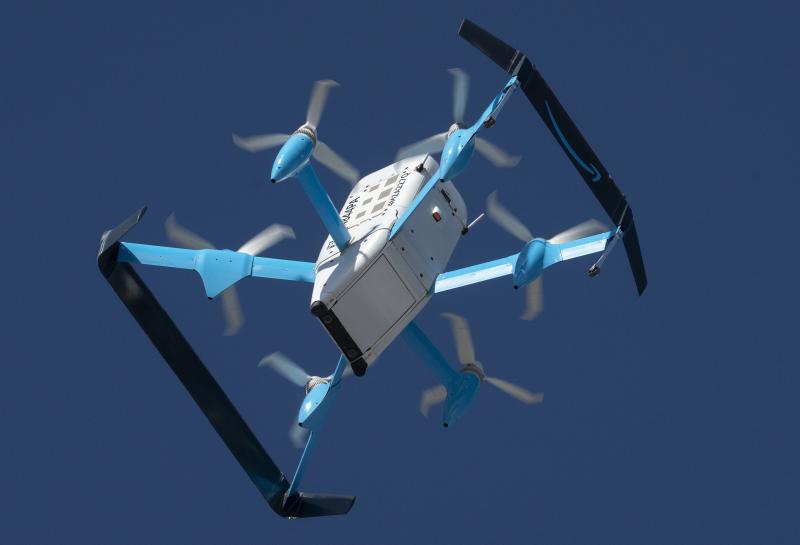 drone takes off package delivery 137908379
