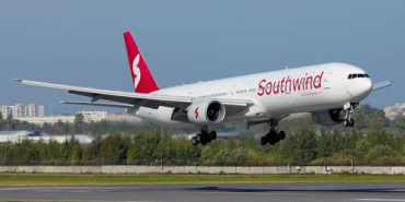 southwind-airlines-boeing-777-300-landing-at-led-shutterstock_2376964279